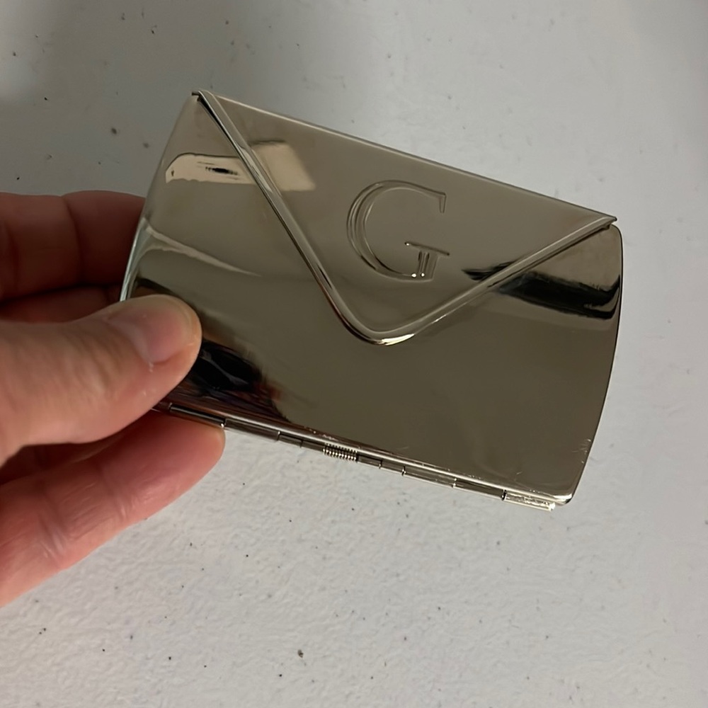 Silver money holder by Guess